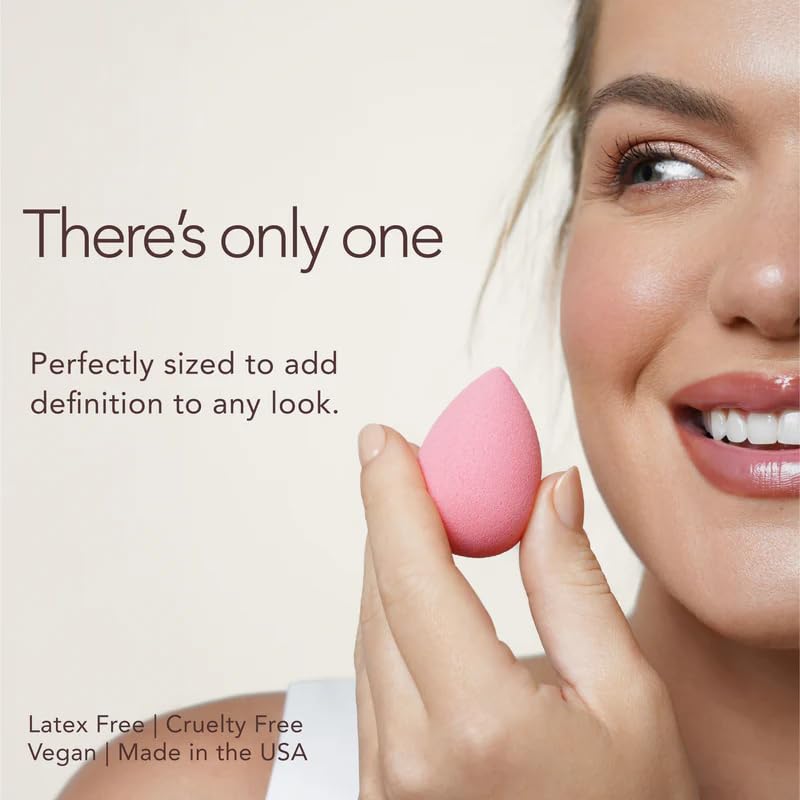 beautyblender Cheeky held in hand to show scale and travel-friendly convenience benefit
