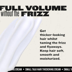 Hand holding one Bed Head Small Talk tube to show scale and travel-friendly size