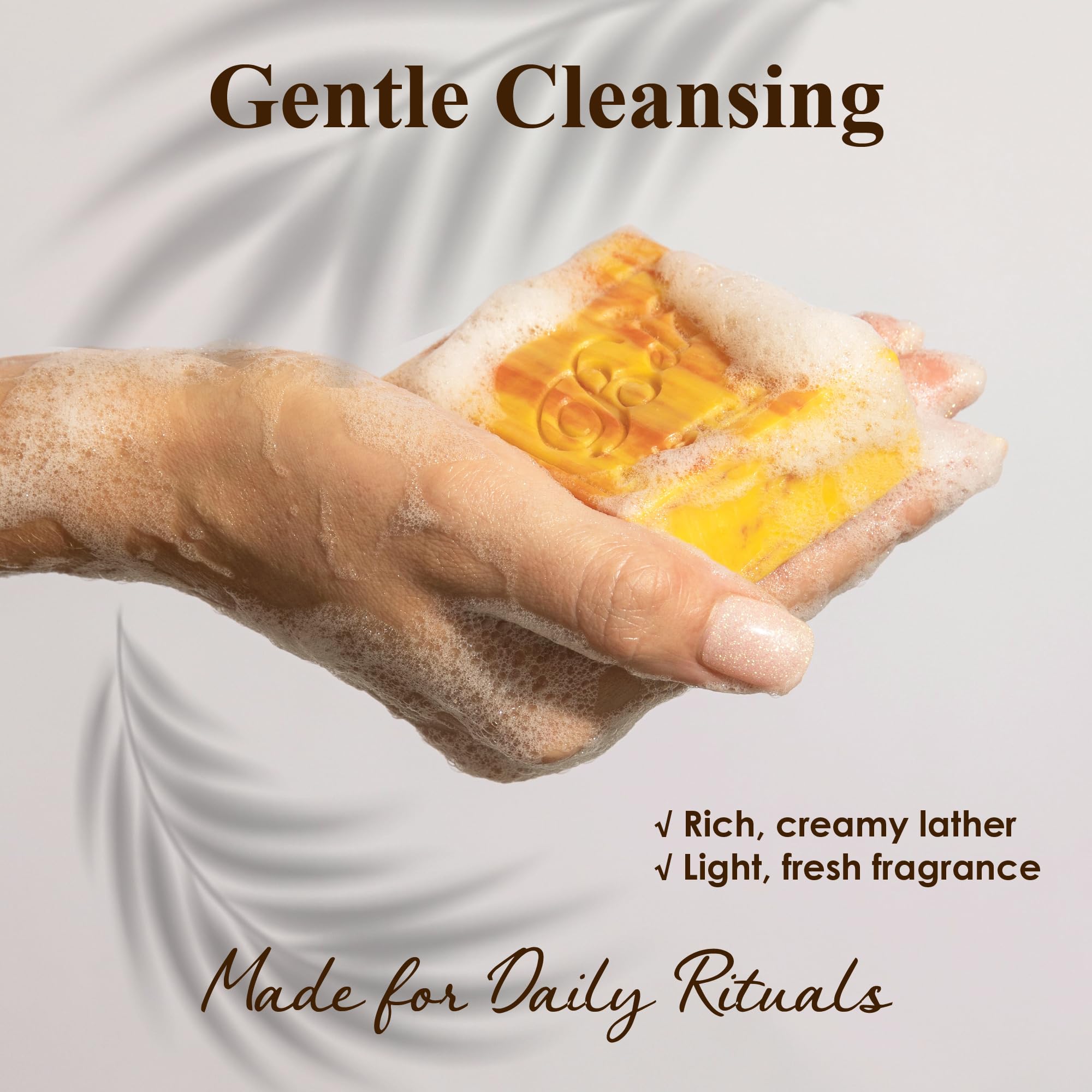 BELA creamy lather in hand demonstrating rich foam and gentle cleansing