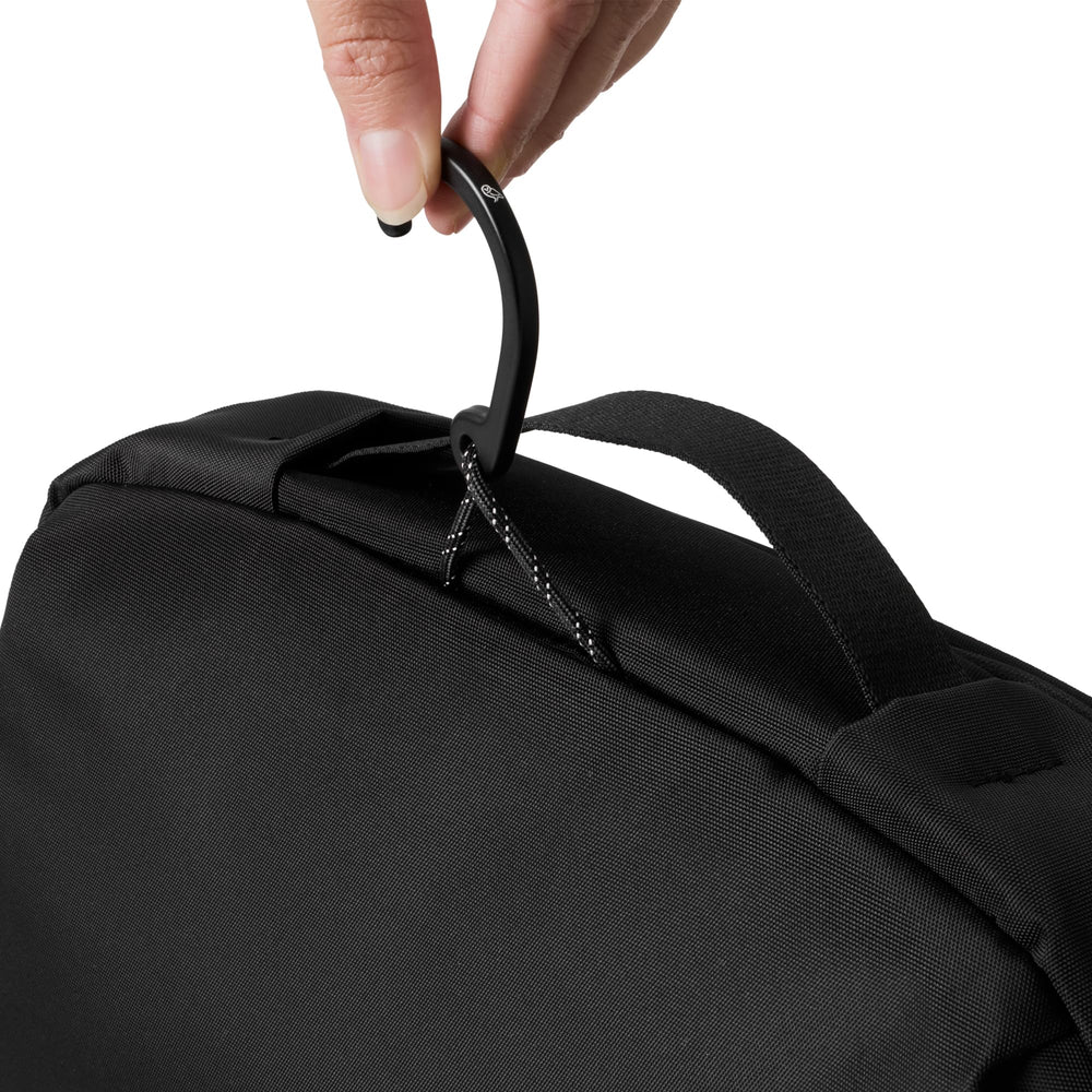 Bellroy hanging on door rail keeping toiletries off wet counters and easy to reach