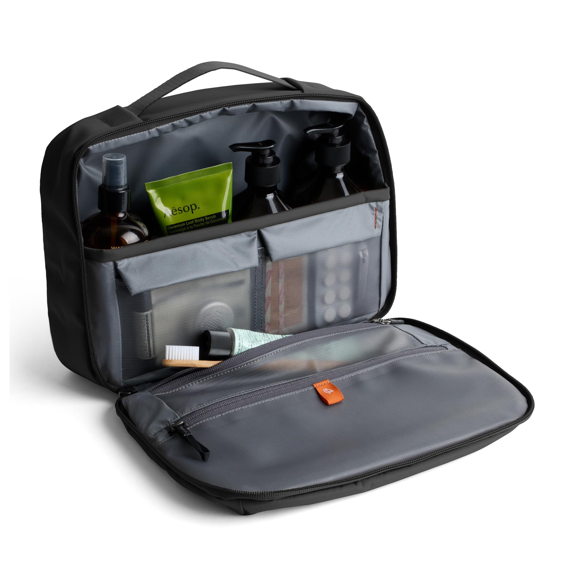 Bellroy opened clamshell interior showing organized pockets for quick visibility and packing