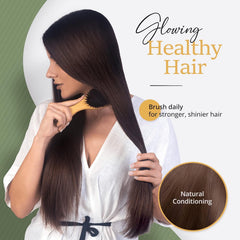 Belula wooden comb detail highlighting wide teeth to protect wet hair while detangling