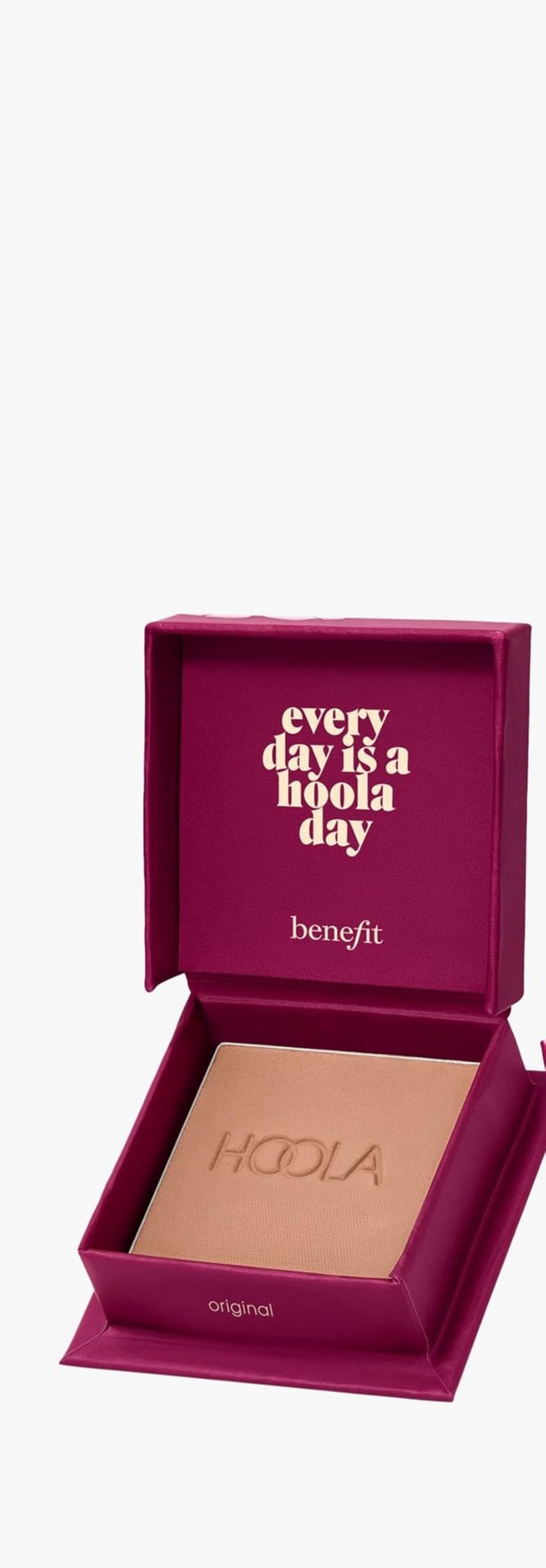 Benefit Hoola mini in a travel pouch on a vanity showing on-the-go use benefit quick touchups