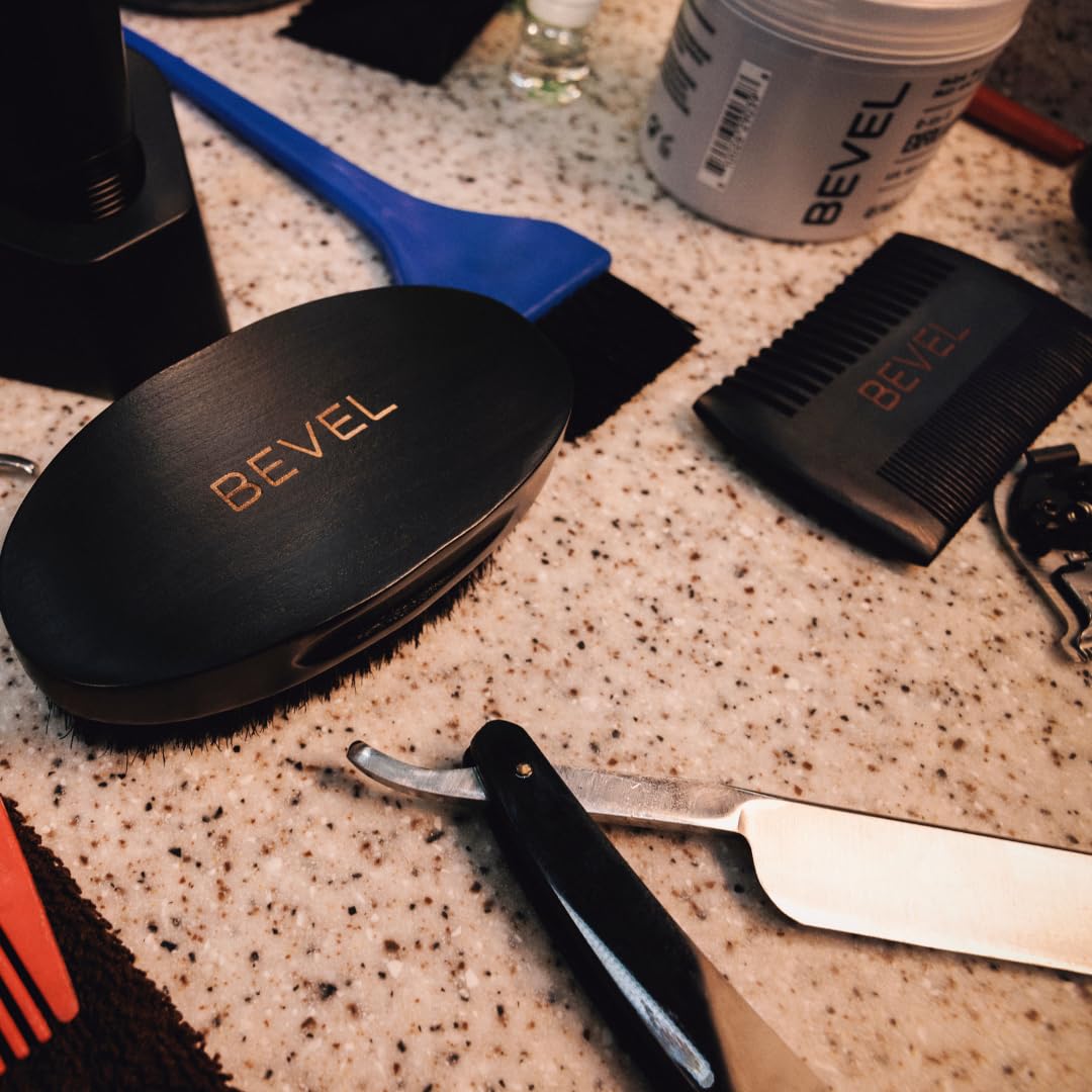 Bevel grooming in use on a bearded man for neat shaping and reduced frizz