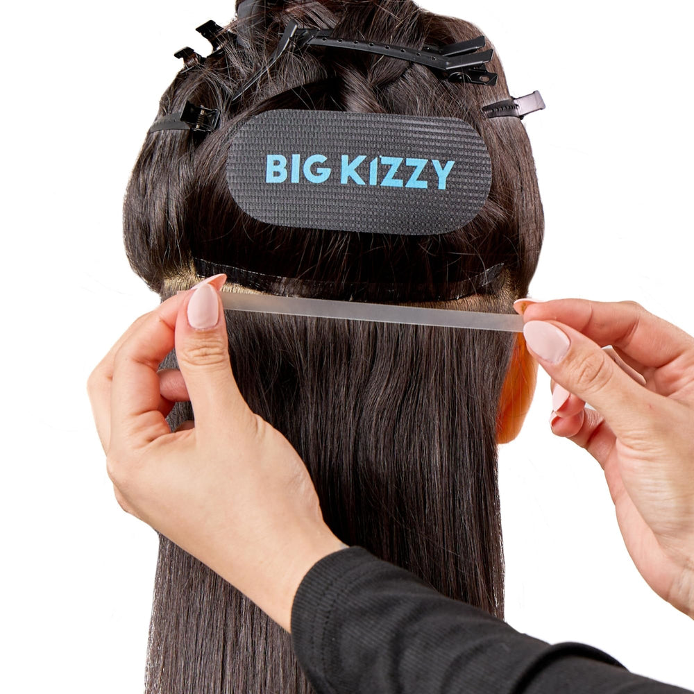 Big Kizzy in-use application showing single-sided tape on a weft for customization