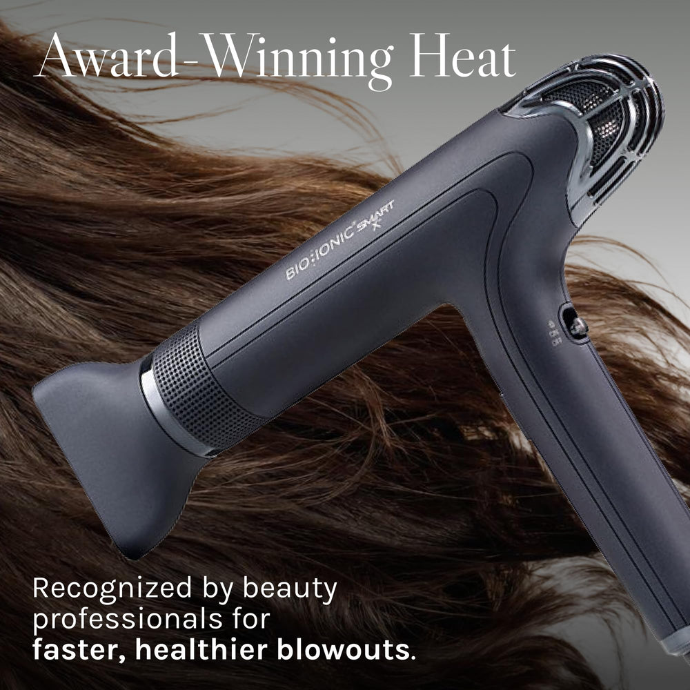 BIO IONIC dryer held in hand to show compact weight and travel-friendly size