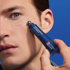 Biotherm Homme tube in a hand for scale showing travel-friendly convenience