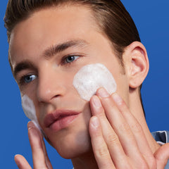Man using Biotherm cleanser in shower showing refreshing rinse and clean feeling