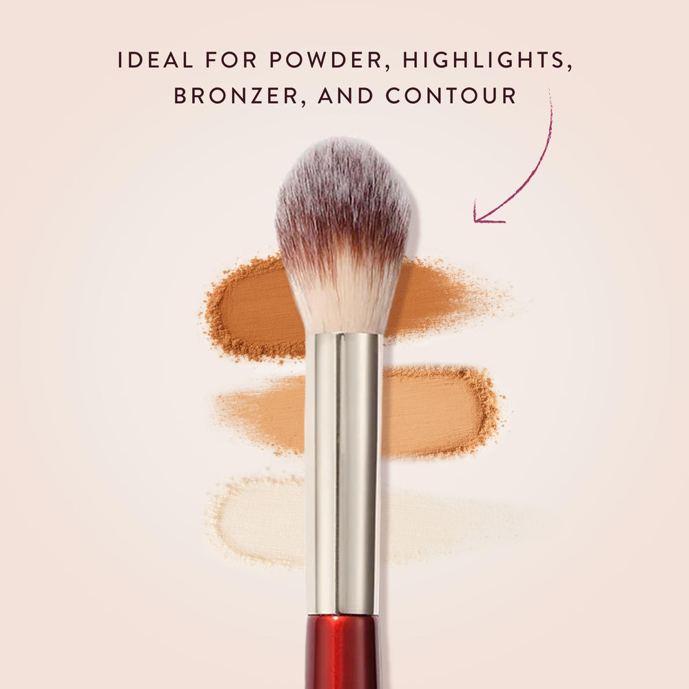 BK BEAUTY brush applying powder under eye for crease-free setting