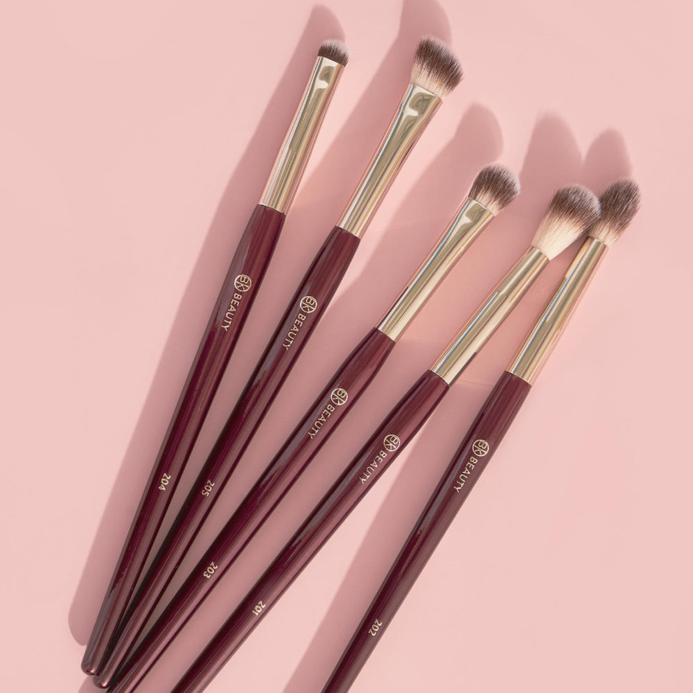 BK BEAUTY brushes held in hand for scale illustrating compact ergonomic size and easy control benefit