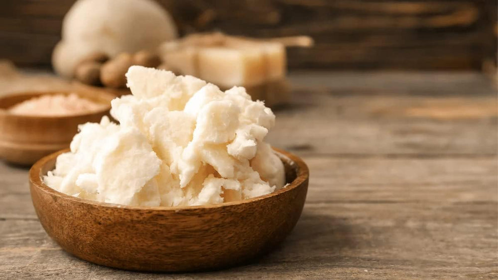 Bless International mango butter applied to hair for conditioning benefits