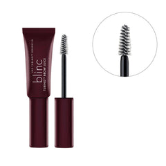 blinc spoolie brushing brows to create lifted shape with flexible hold