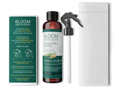 Bloom Health Goods spray misting onto hair illustrating lightweight absorption and non-greasy finish