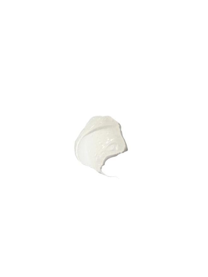 Blue Lagoon lip balm next to a coin for 10 ml size comparison and portable skincare convenience