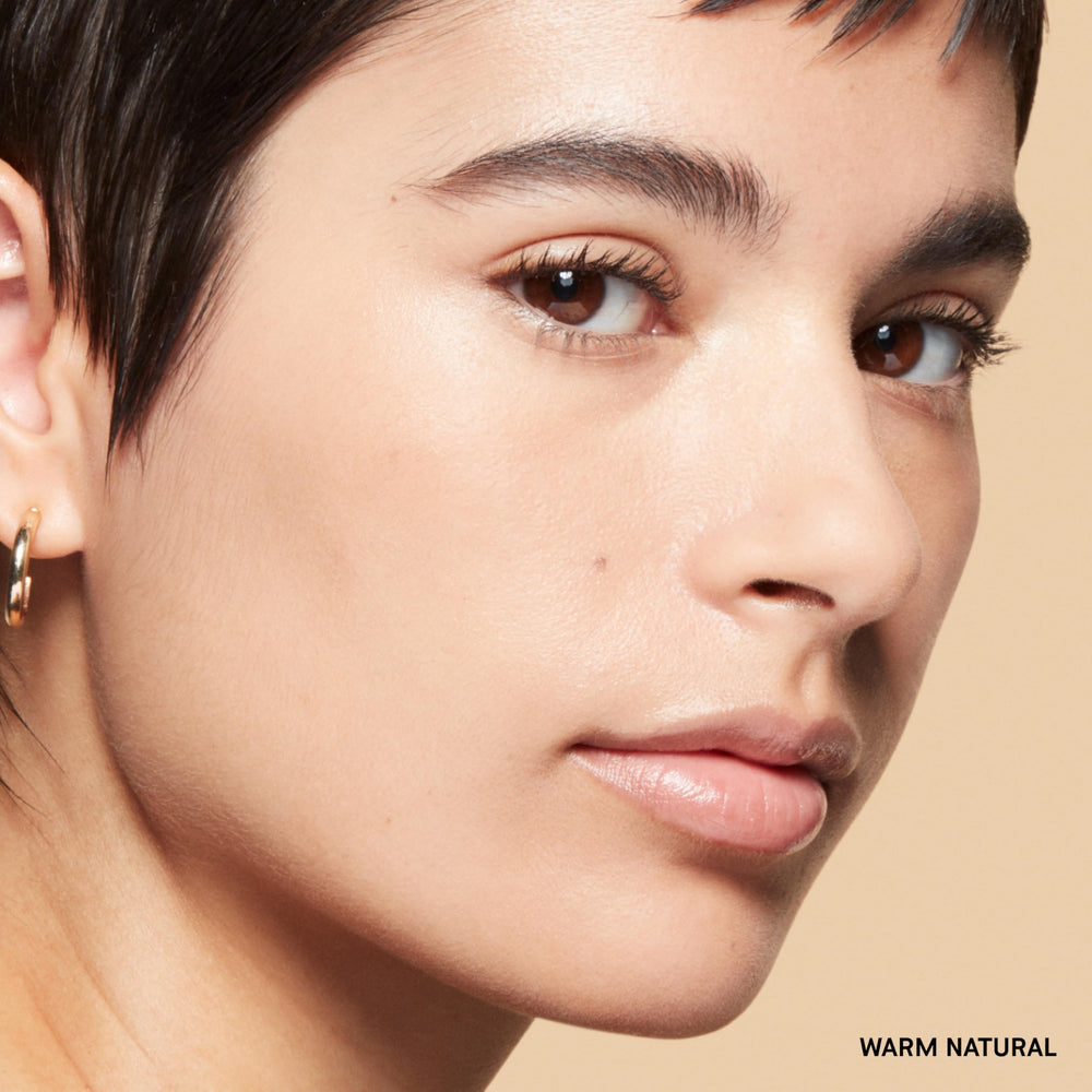 Bobbi Brown powder applied with brush demonstrating even mattifying coverage