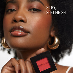 Bobbi Brown brush swatch of Nectar on wrist showing buildable color payoff benefit