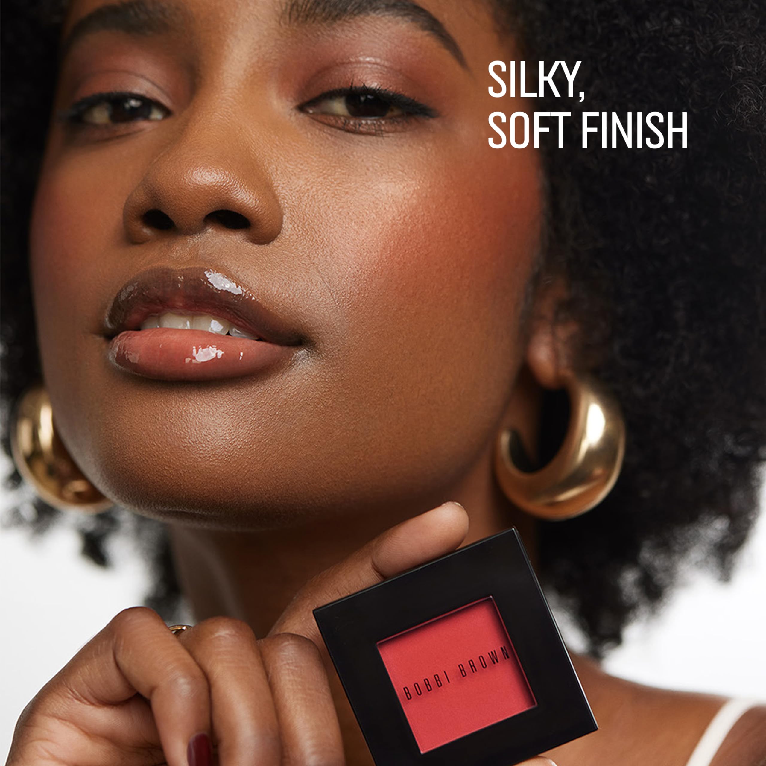 Bobbi Brown texture swatch on skin showing buildable color payoff benefit: customizable intensity
