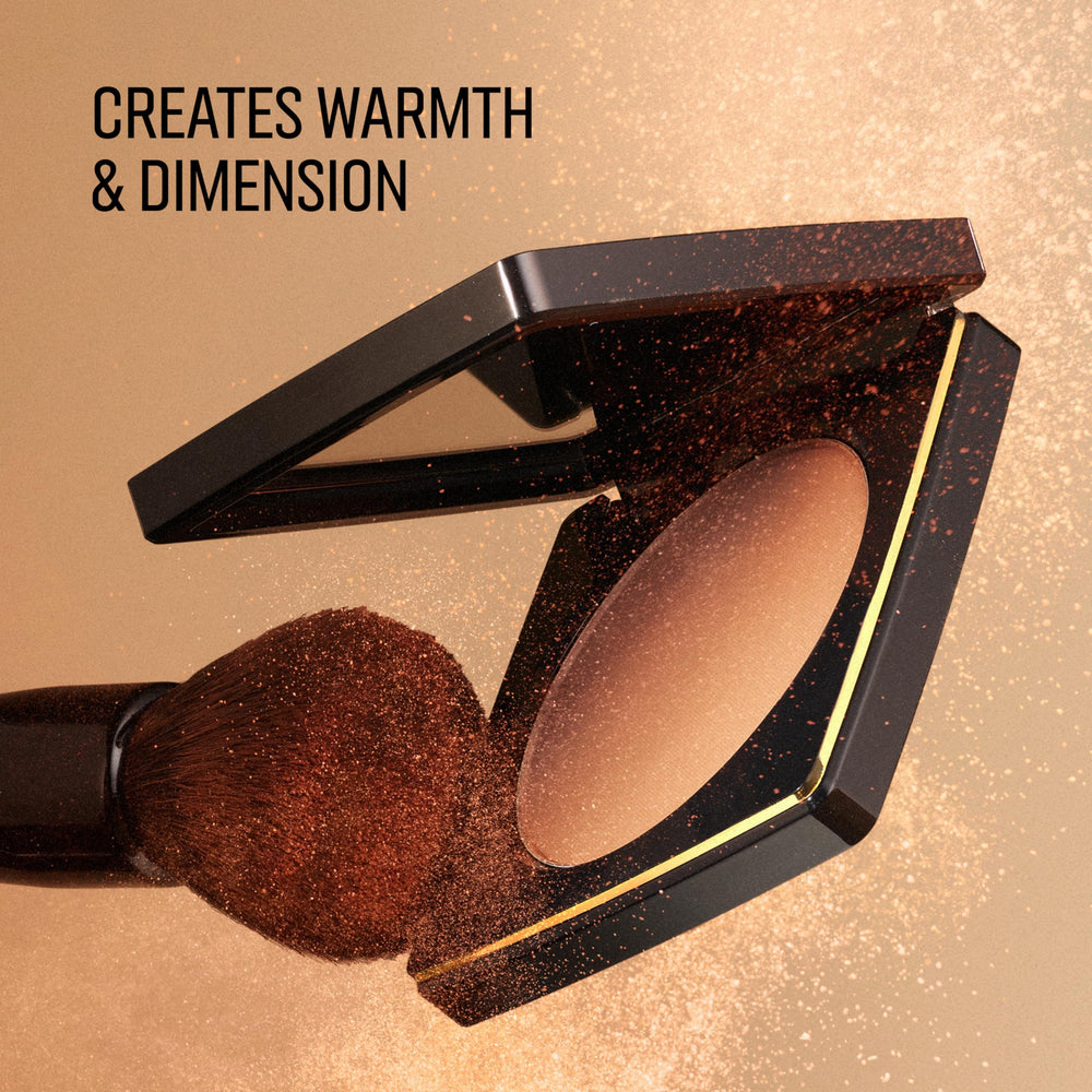 Bobbi Brown bronzing powder on model showing natural warmth and matte contour benefit