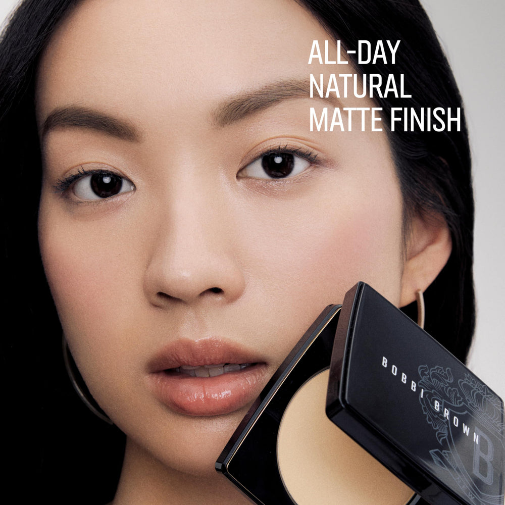 Bobbi Brown compact open next to coin for scale, ideal for on-the-go touch-ups