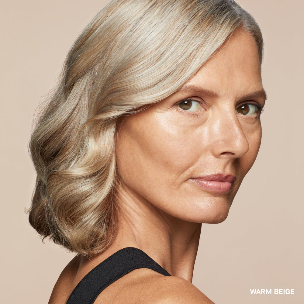 Bobbi Brown concealer placed beside foundation to layer seamlessly