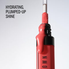 Bobbi Brown lip swatch on model showing tinted shimmer and comfortable shine