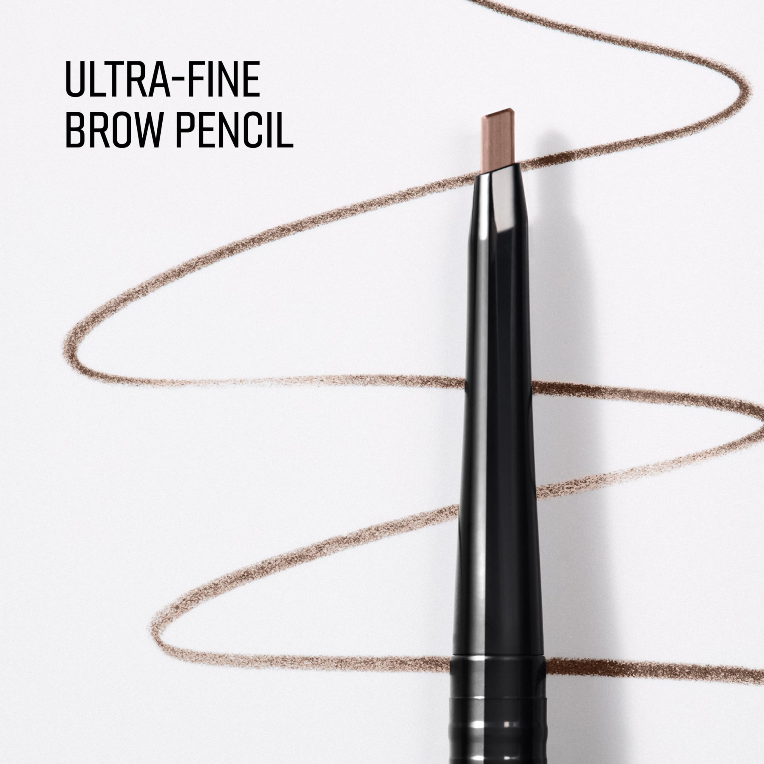 Bobbi Brown pencil held in hand showing size and precise control during application