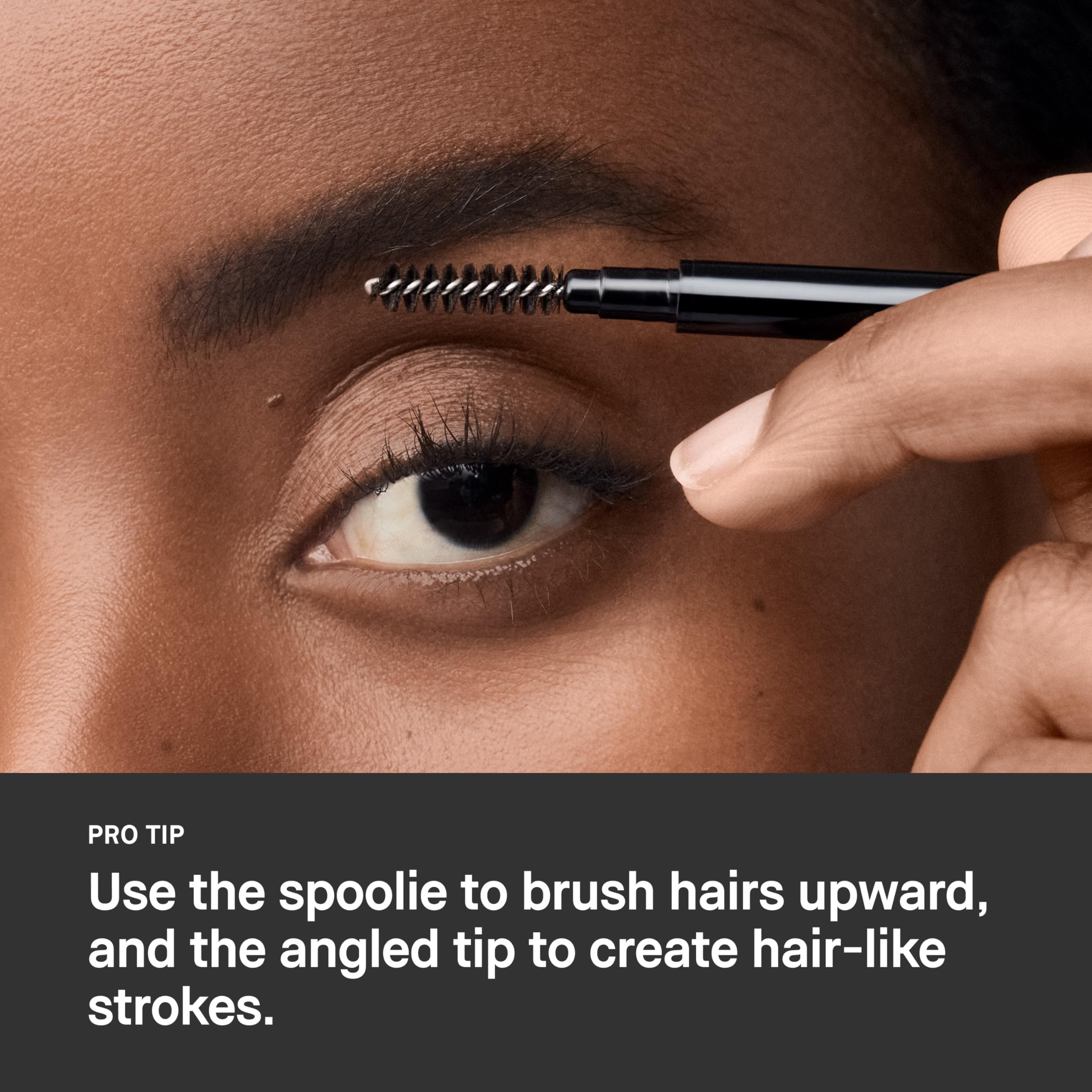 Bobbi Brown lifestyle application on model brows showing natural definition benefit
