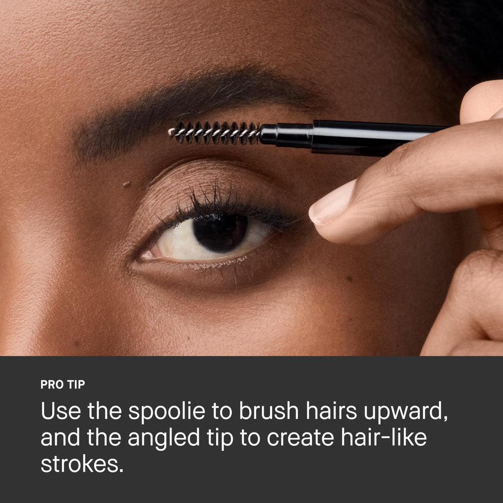 Bobbi Brown Precise Brow Pencil on bathroom vanity with mirror showing everyday styling convenience