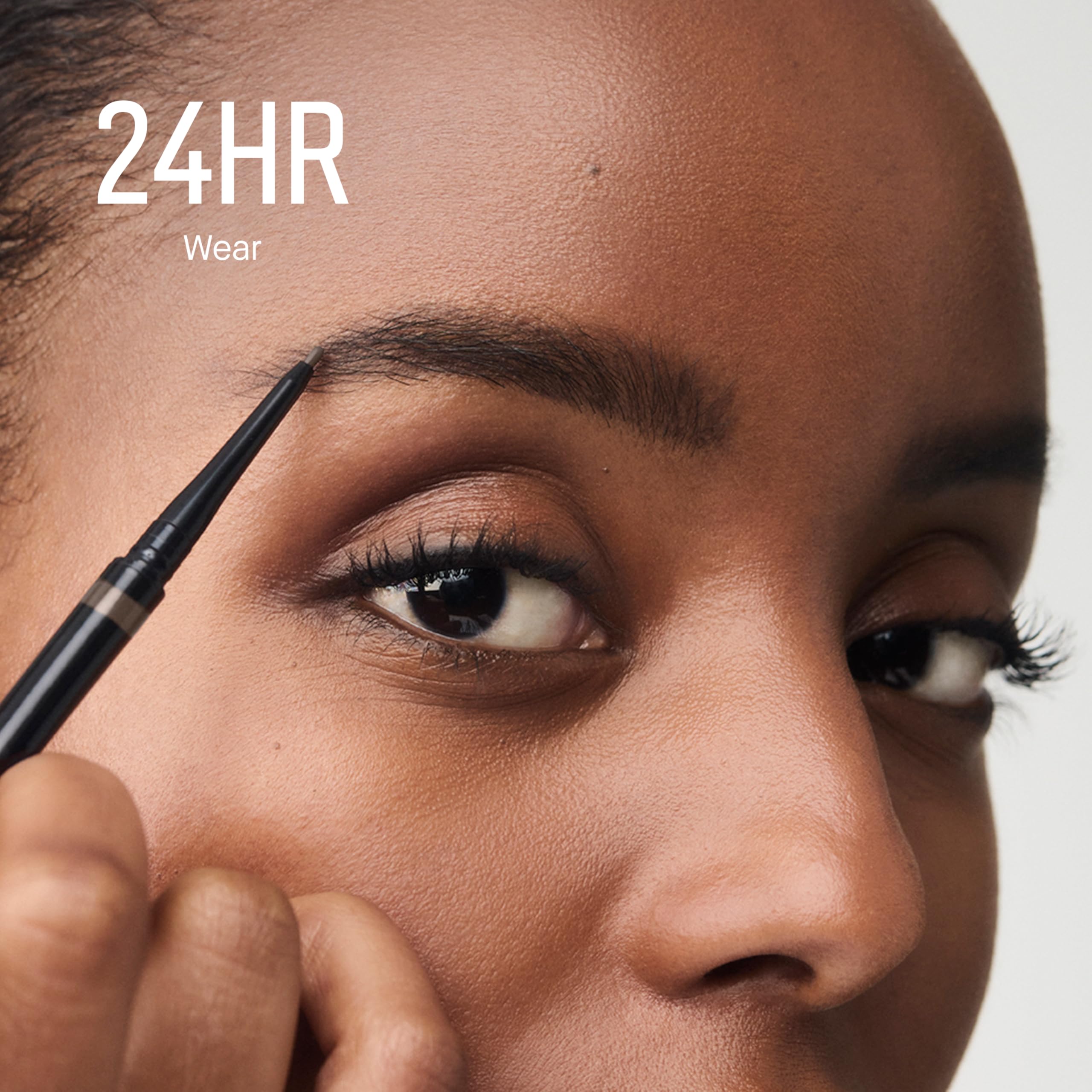 Bobbi Brown pencil strokes on skin demonstrating buildable natural color