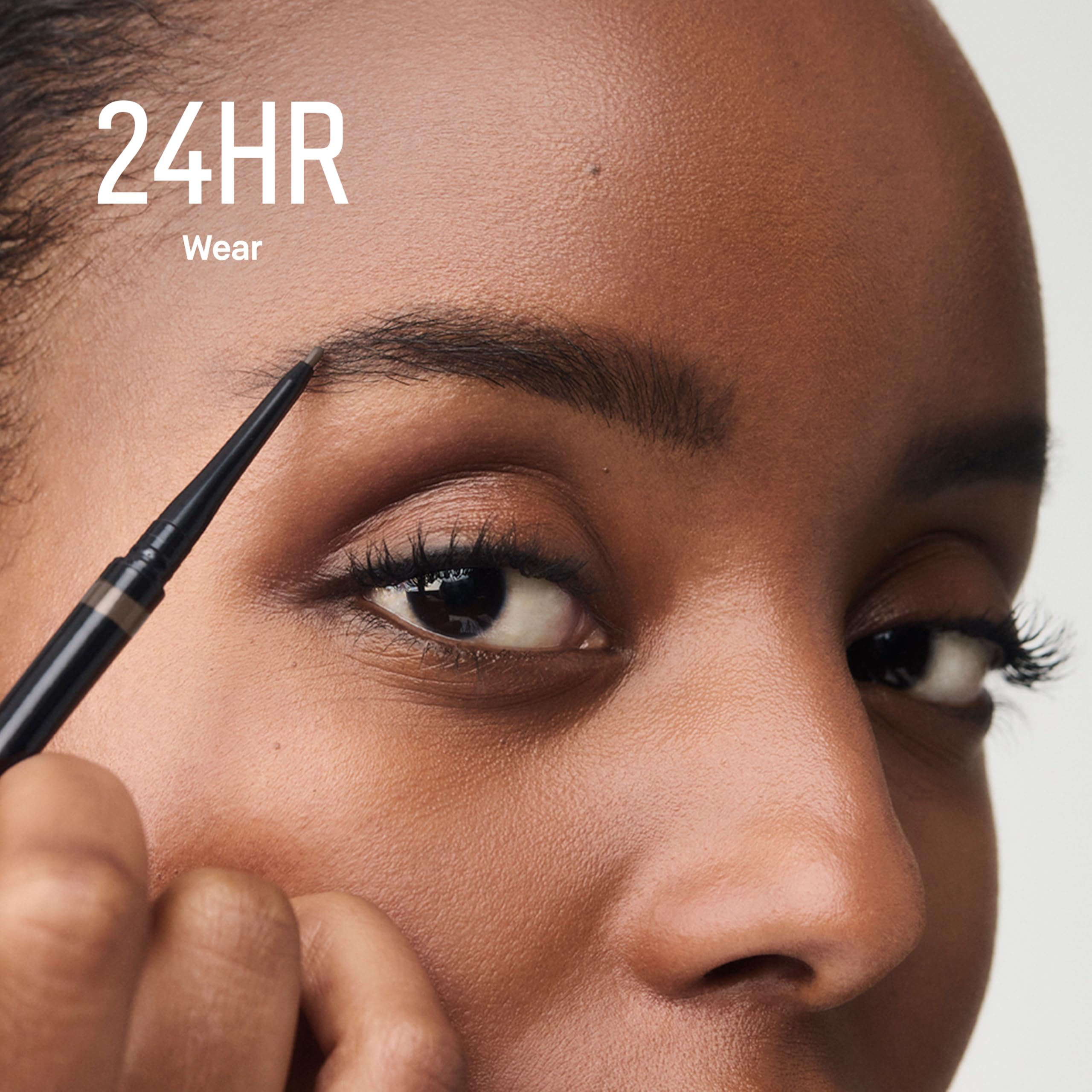 Bobbi Brown color swatches on arm showing 12 shades and buildable coverage