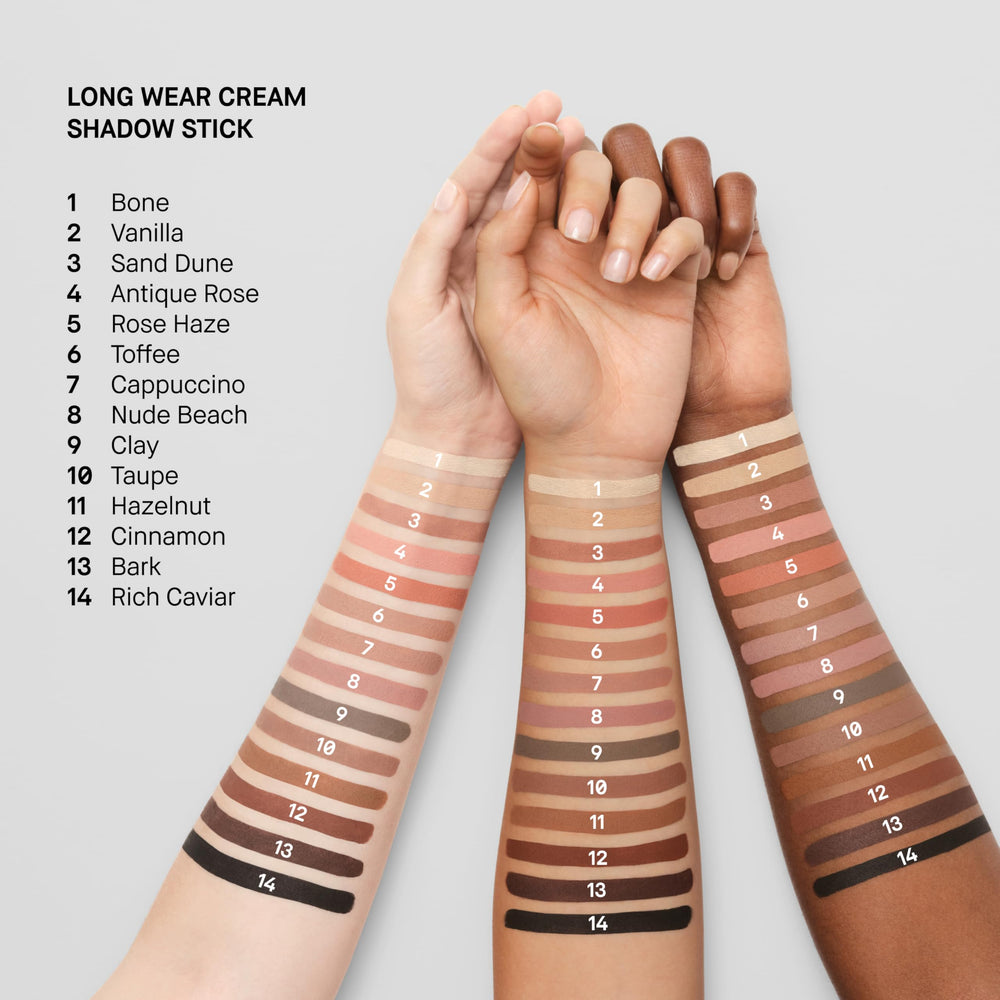 Bobbi Brown vanilla stick next to fingers to show compact travel size