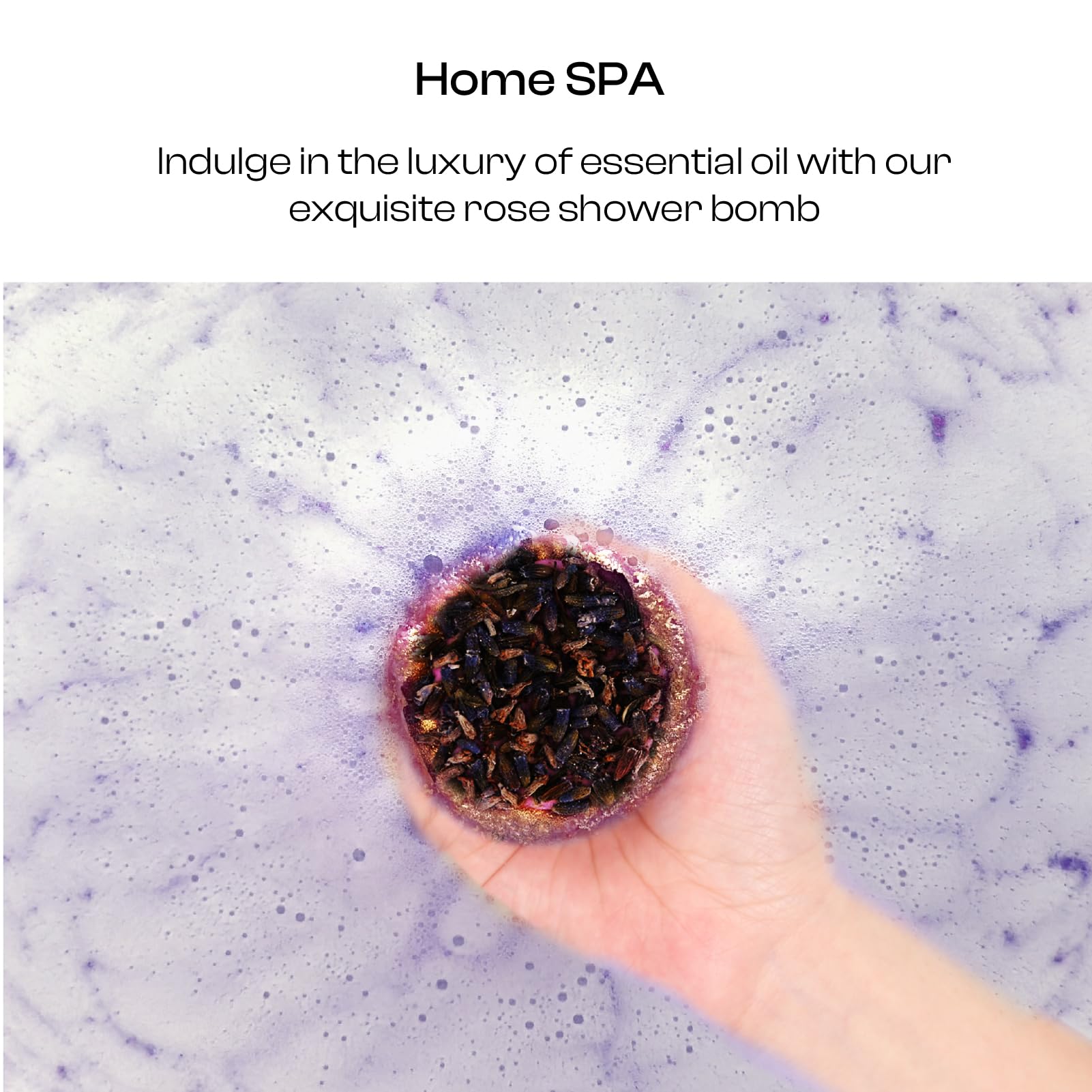 Hand holds one BoboSweeTree bath bomb to show size for clear usage expectation