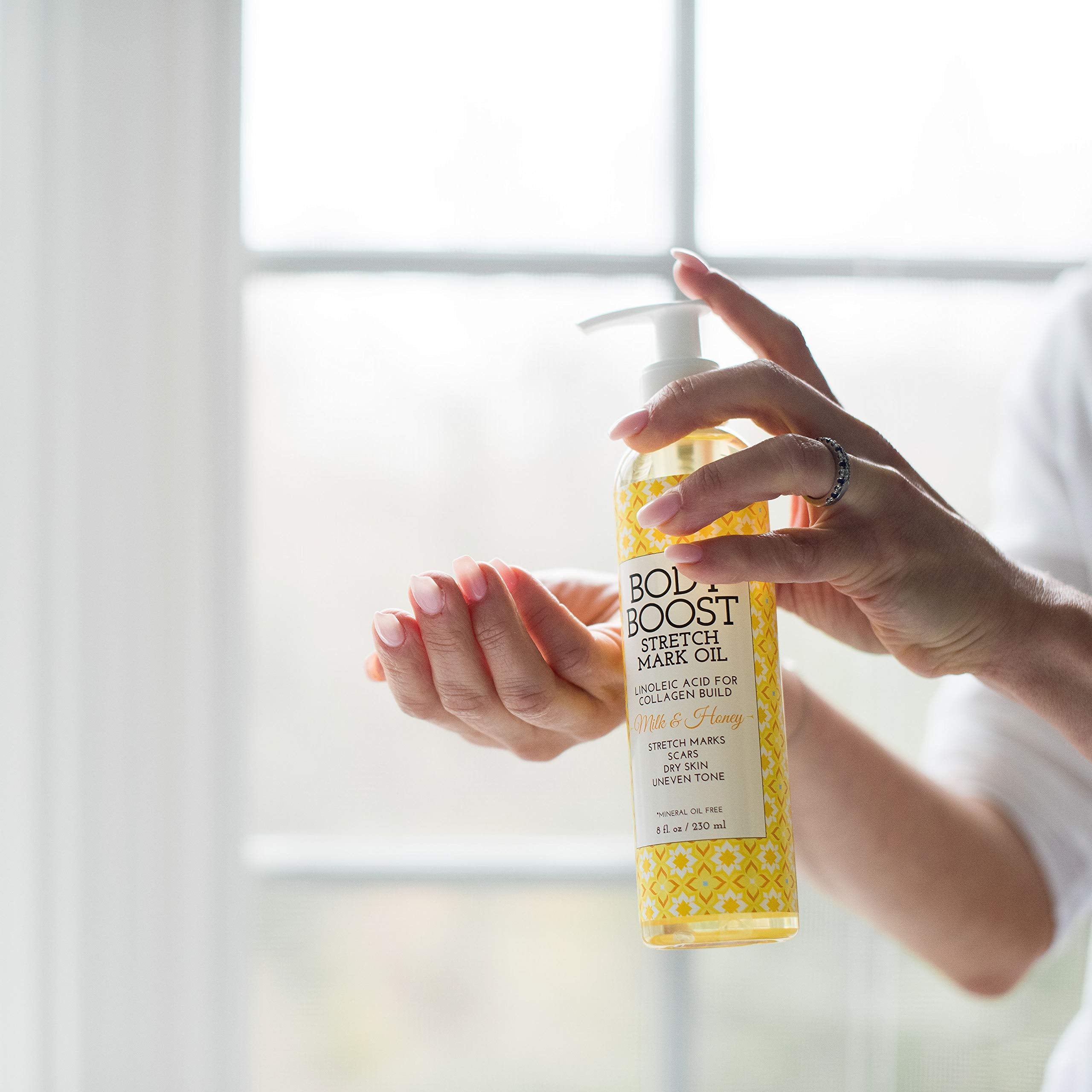 Body Boost applied to abdomen showing gentle massage benefit