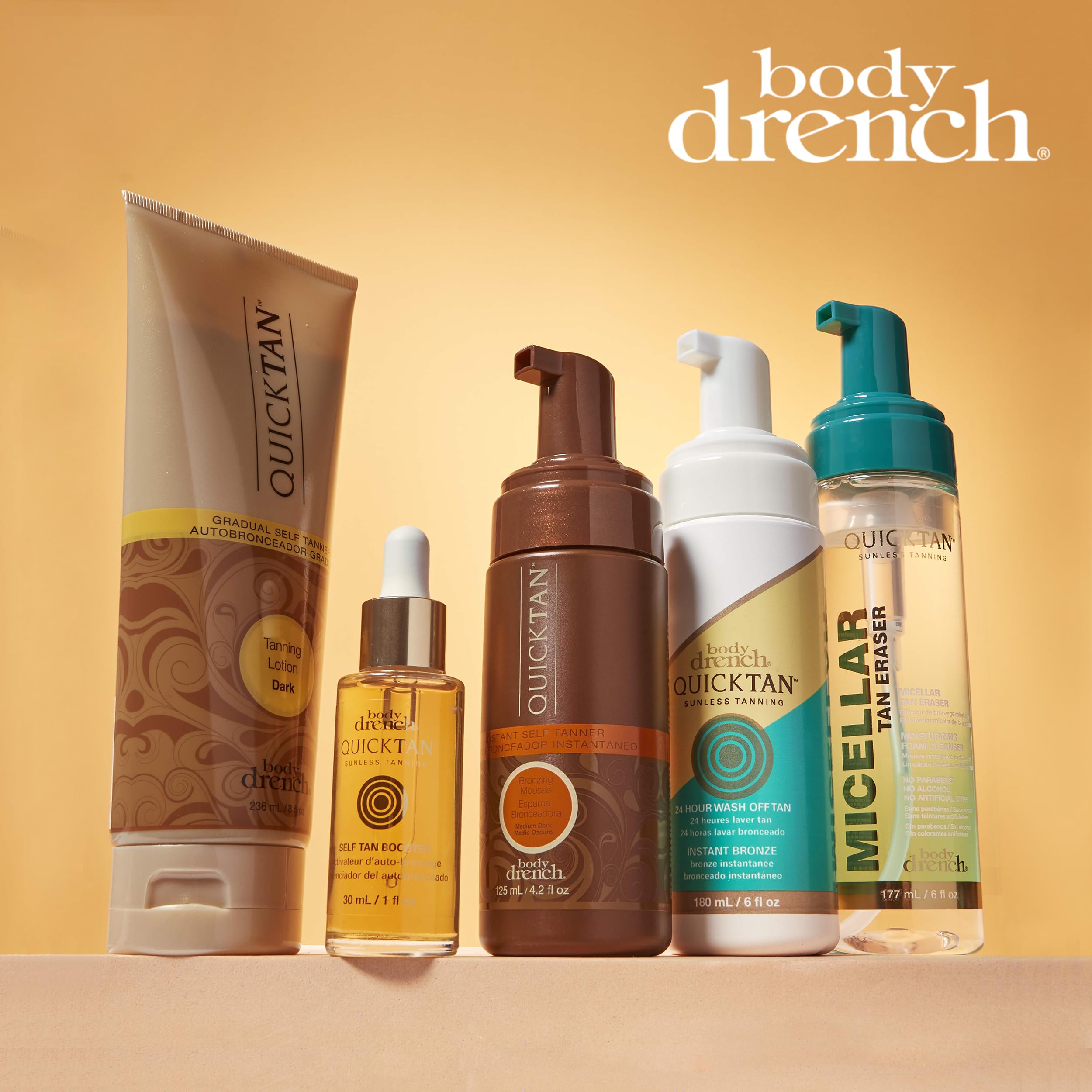 Body Drench bottle in beach bag lifestyle scene for sunless glow on the go