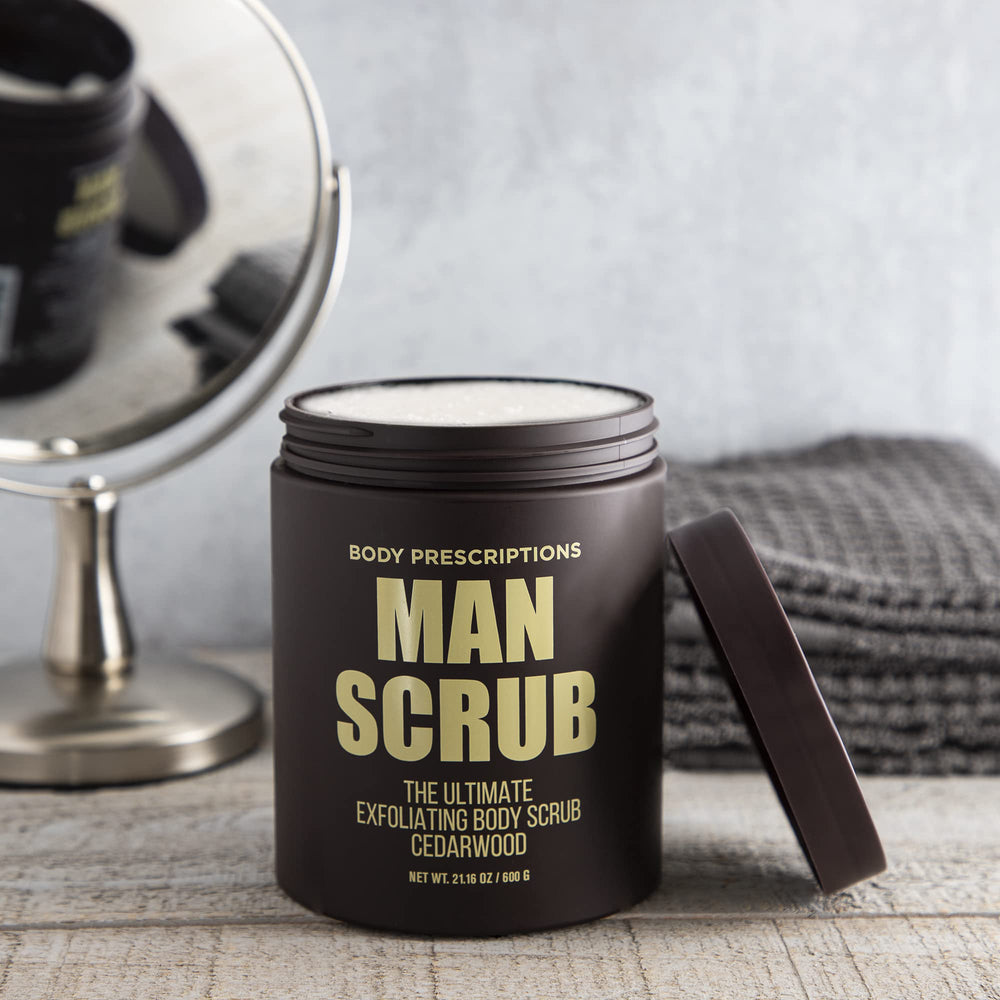 Body Prescriptions applying scrub on forearm demonstrating gentle exfoliation and refreshed skin