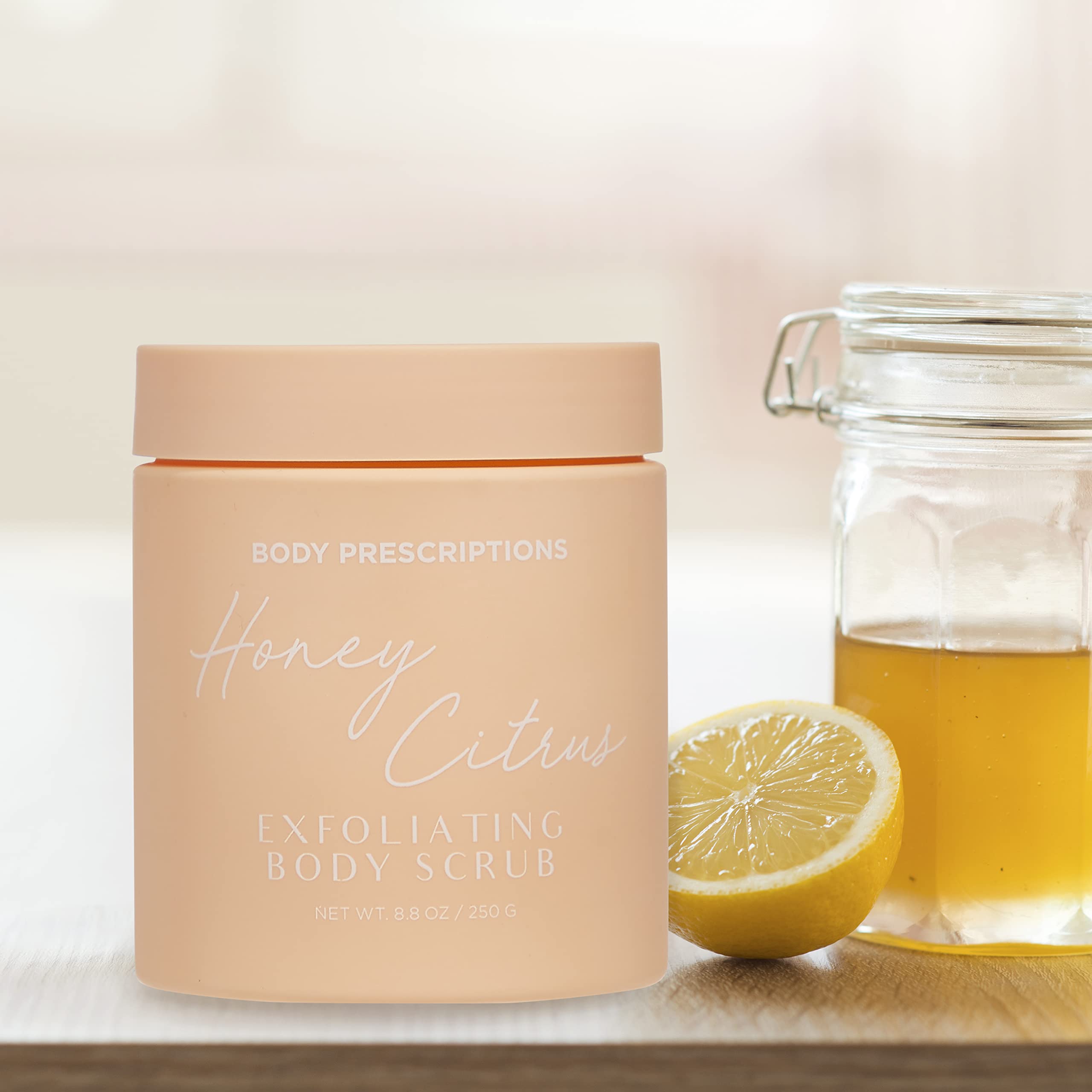 Body Prescriptions scrub scooped in hand demonstrating spreadable consistency and easy application