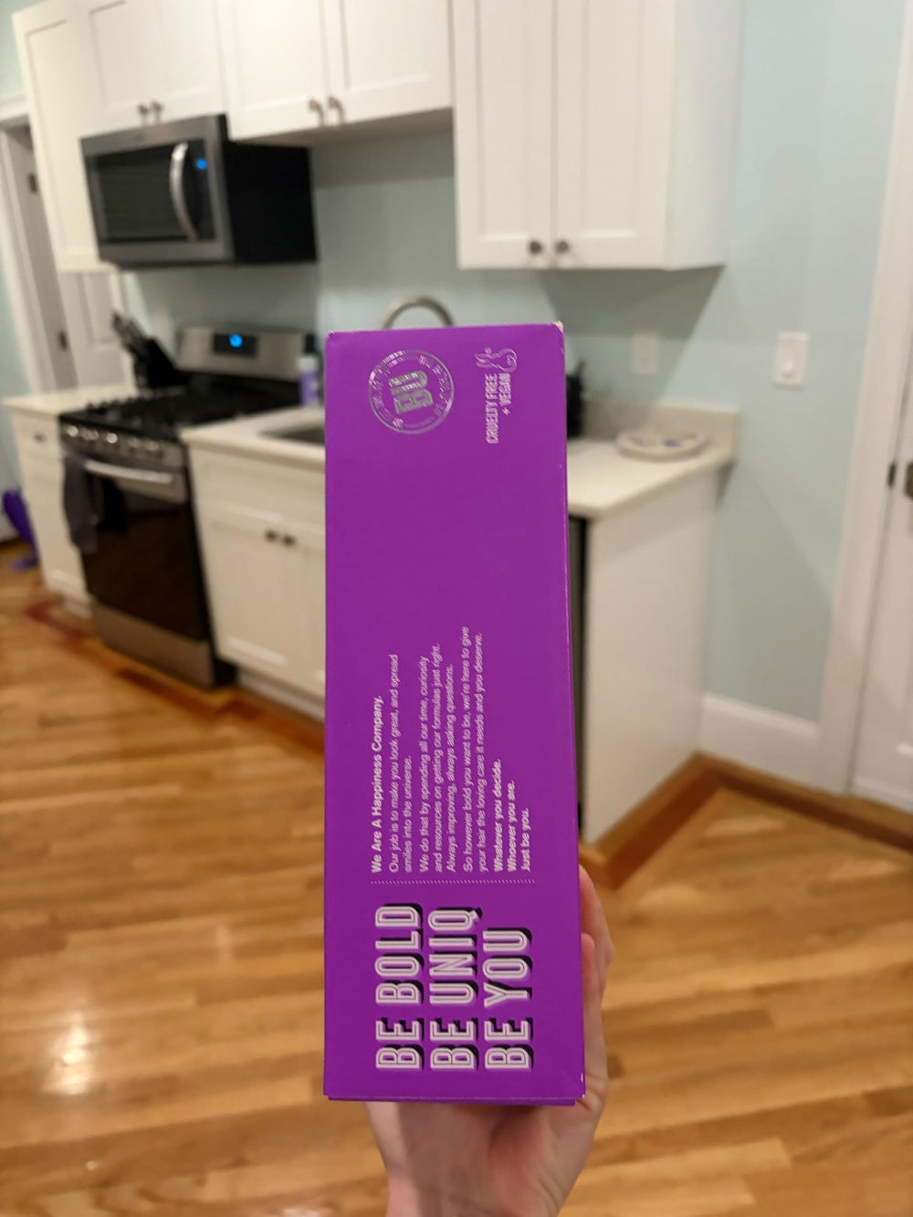 BOLD UNIQ purple conditioner label focused shot showing nourishing formula