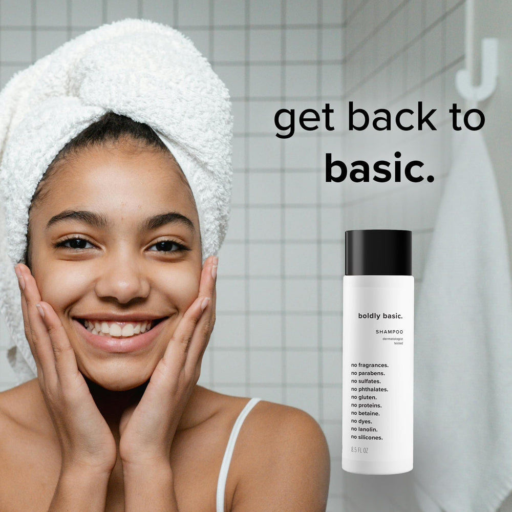 Boldly Basic shampoo on bathroom shelf in use-friendly setting showing calm routine benefit