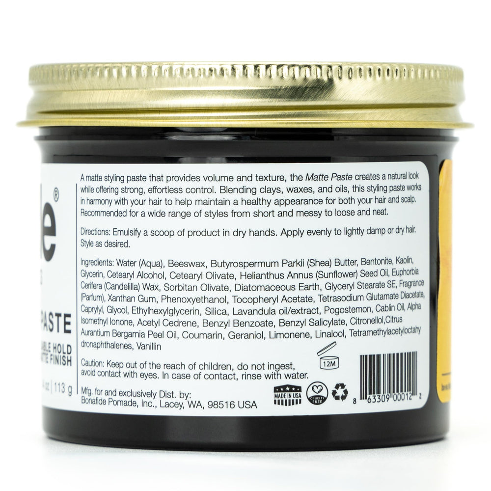 Bona Fide Pomade on bathroom vanity next to grooming tools for daily styling routine