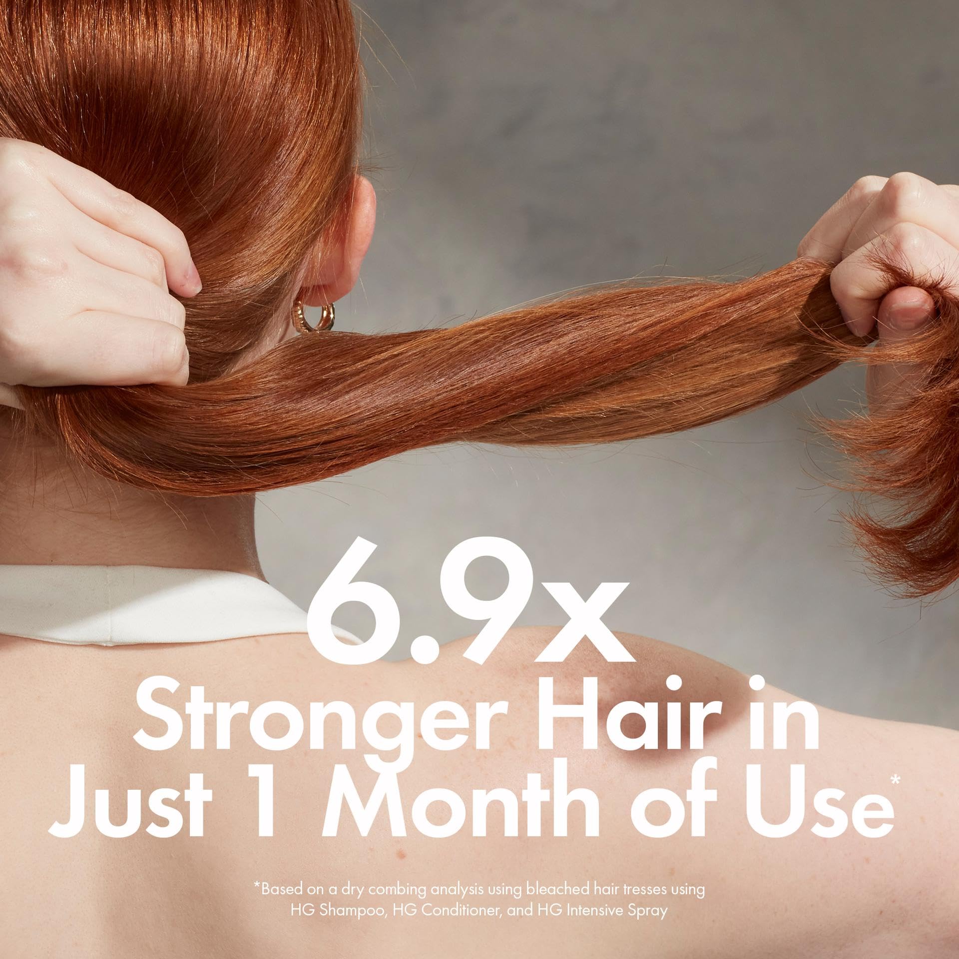 BONDIBOOST conditioner being applied to mid-lengths for detangling benefit