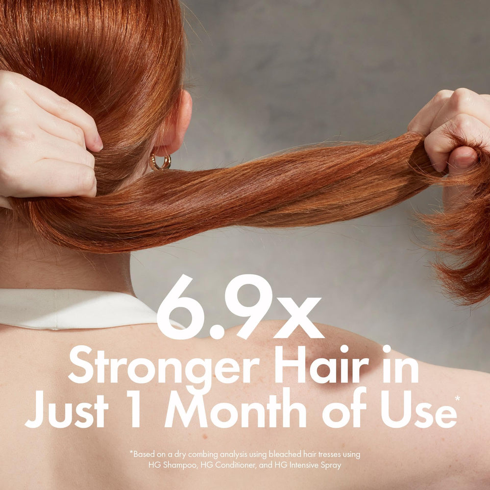 BONDIBOOST conditioner being applied to mid-lengths for detangling benefit