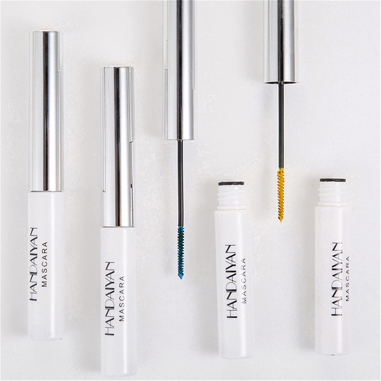bonnie choice mascara tubes next to a coin showing compact travel-friendly size