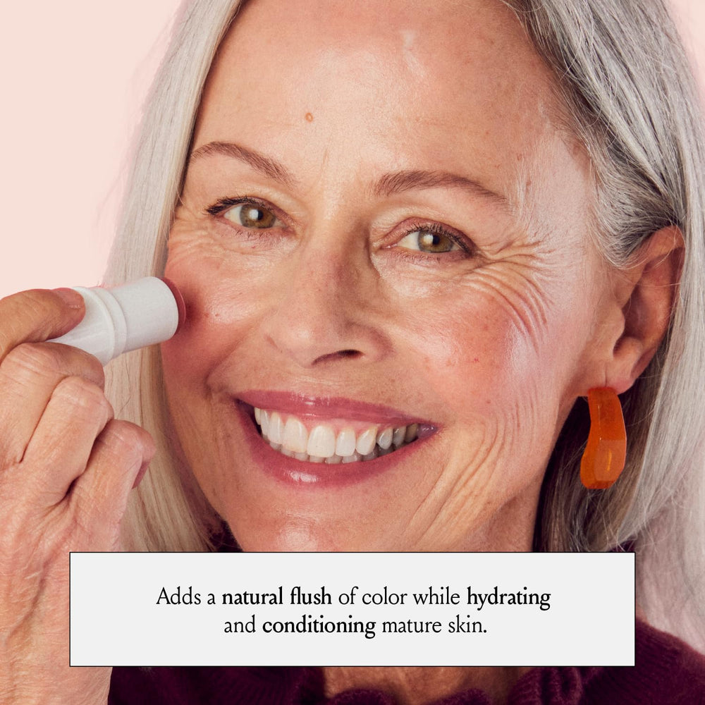 BOOM! by Cindy Joseph applying tint to lips for hydrated, natural-looking color