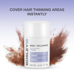 BosleyMD applying fibers to part line for instant fuller hair effect