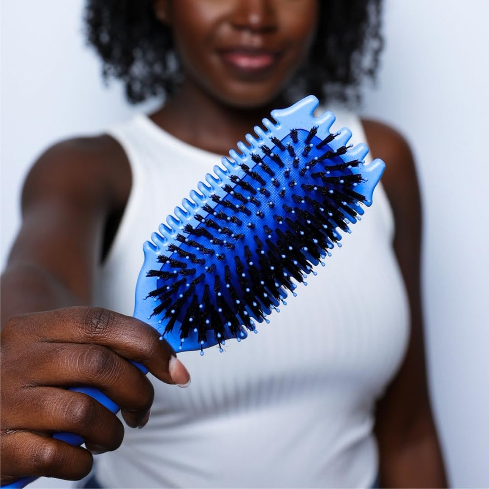 Bounce Curl product packaging with brush and care card for easy start