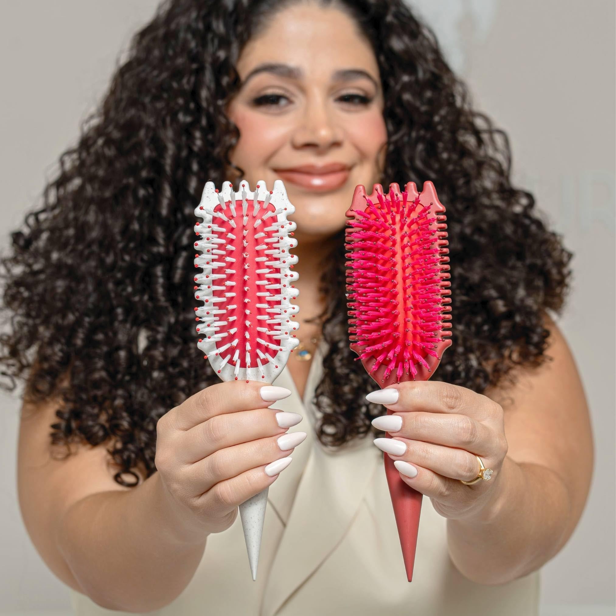 Bounce Curl being used on damp curly hair to create lift and airy clumps