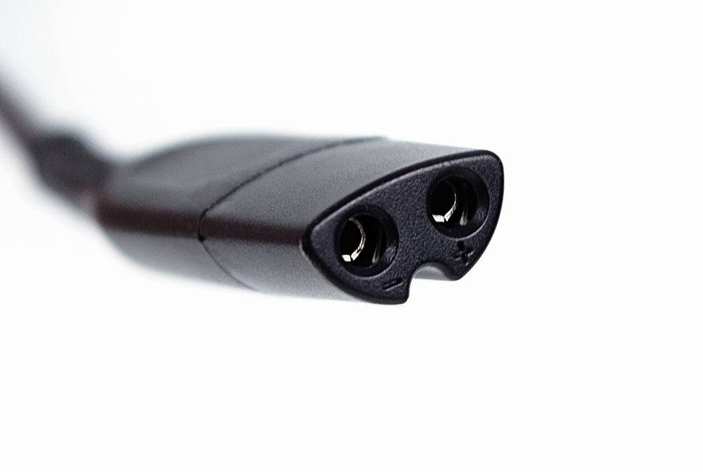 Braun charger in use with shaver showing connected charging benefit restores power