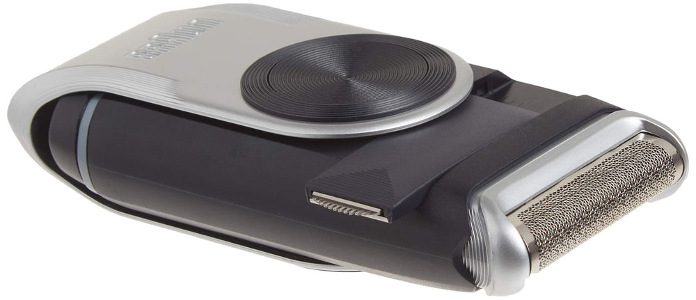 Braun M90 open battery compartment showing AA battery access for quick replacements