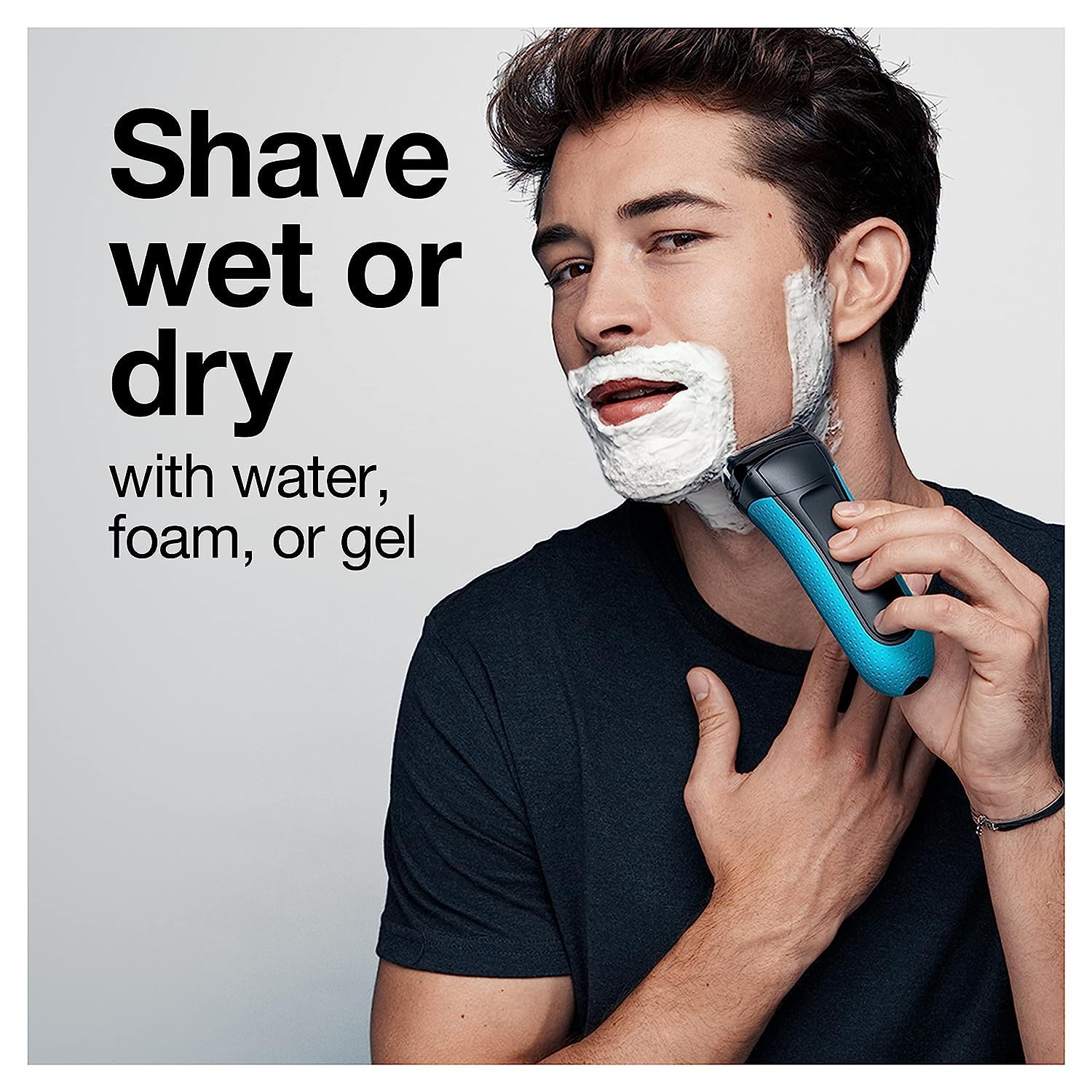Braun shaver held in hand to show size and travel-friendly benefit