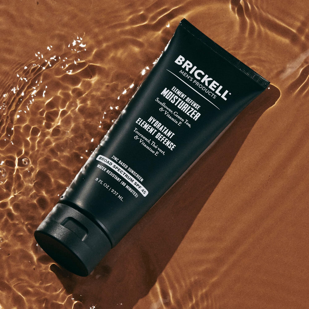 Brickell being applied to male forearm demonstrating hydration and broad-spectrum protection